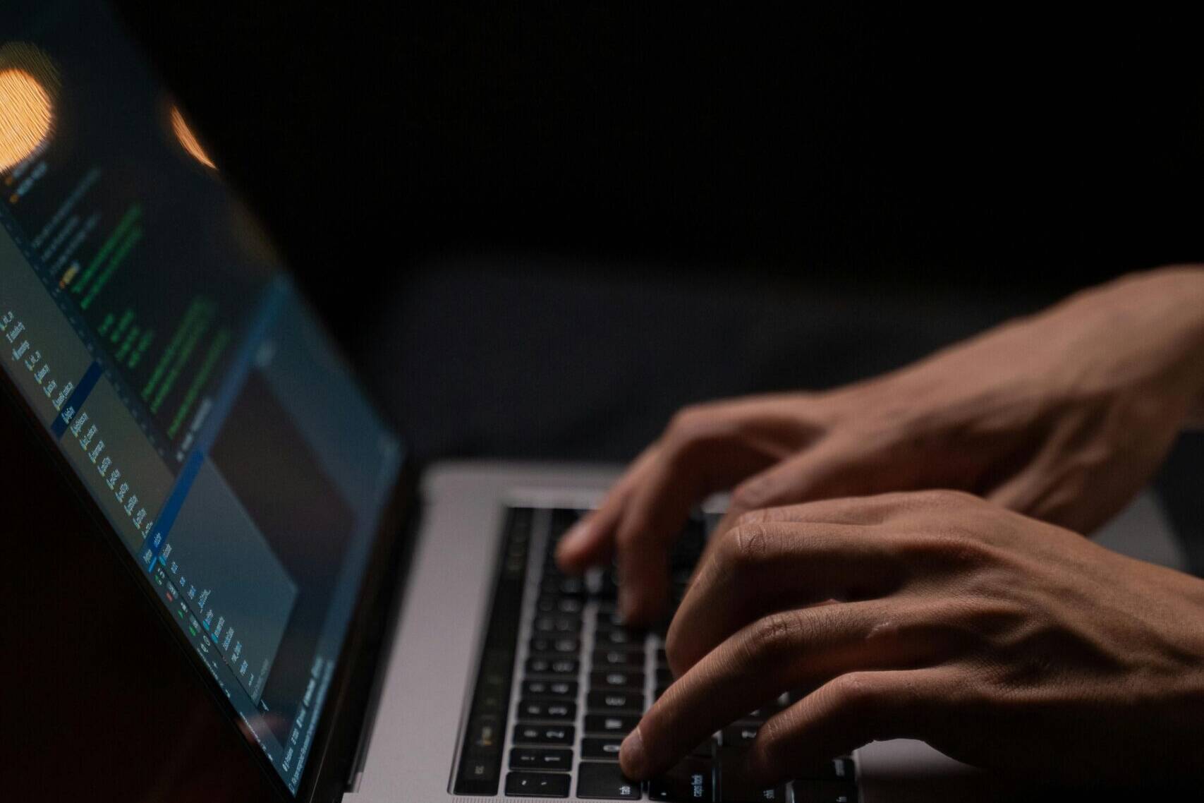 person-using-silver-and-black-laptop-computer